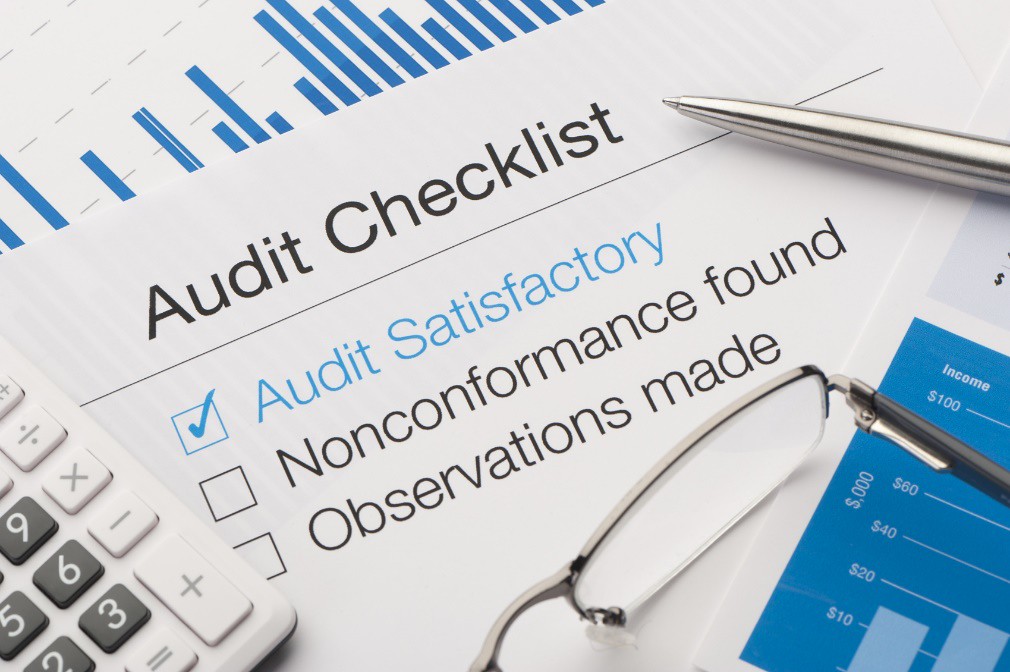 Audit checklist on paper representing an estate cleanout first-30-days checklist